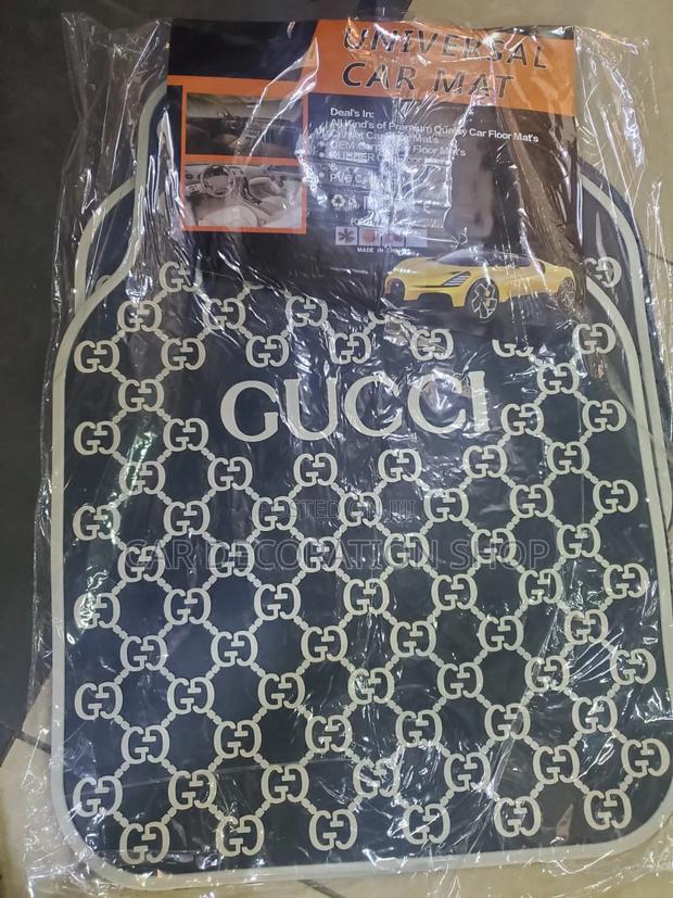 Gucci Branded Mats With White Logos