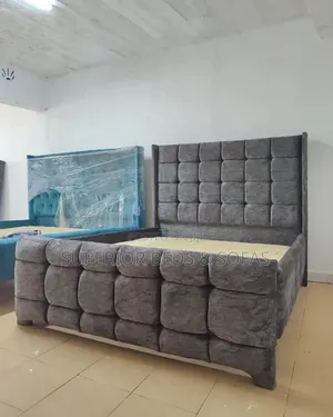 Tufted Upholstered Bed Size 5 by 6.