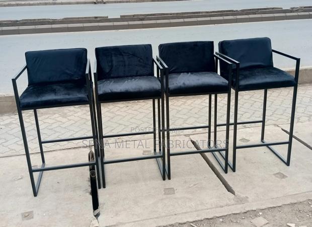 Sturdy and Comfort Black Velvet Armchair.