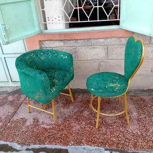 Green Velvet Salon Chairs With Gold Glitter Stripes.