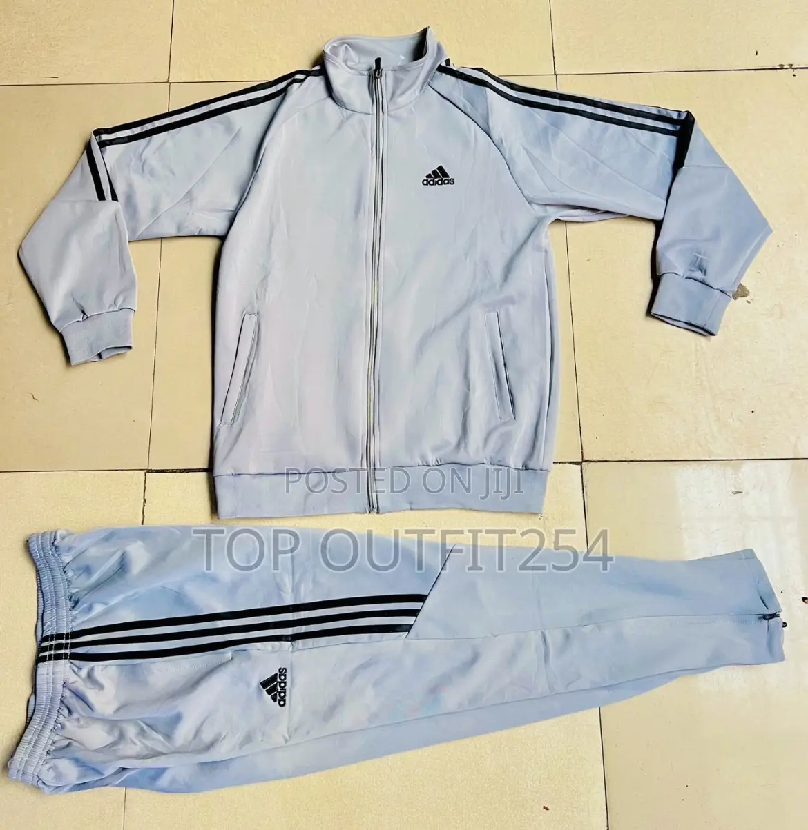 Adidas Premium Tracksuits.