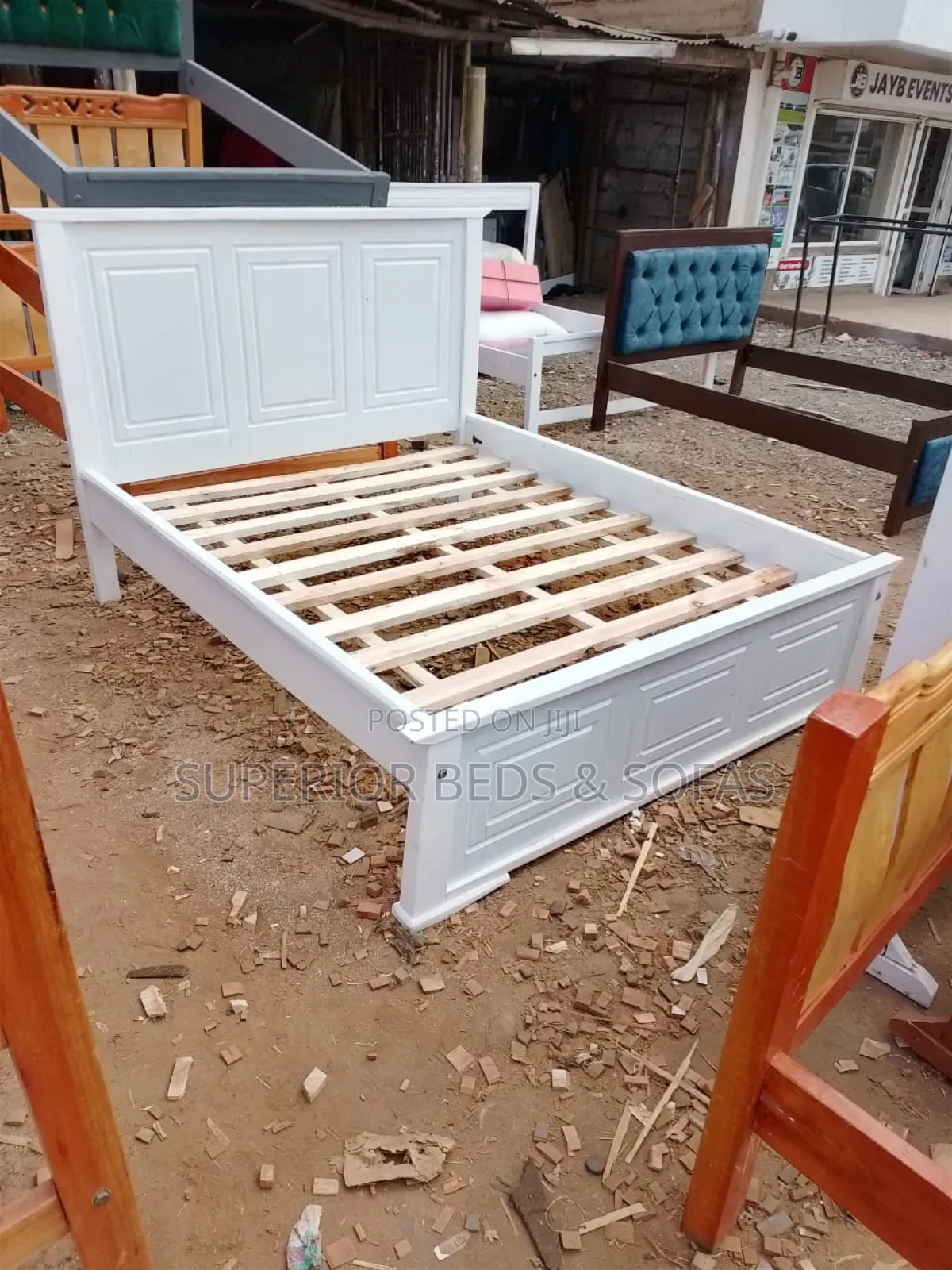 White 5 by 6 Wooden Bed