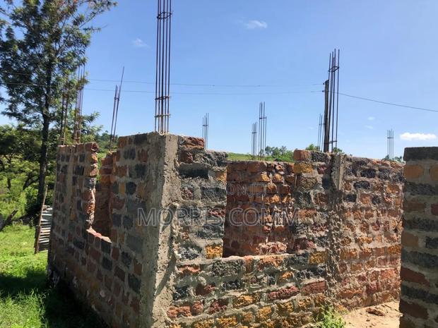 Plot With House Under Construction - main view