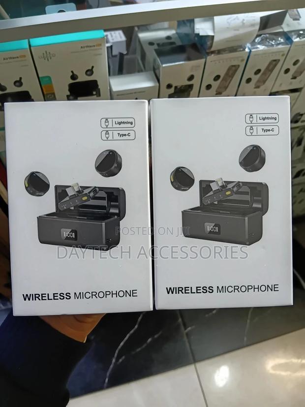 Wireless Lavalier Microphones With Charging Cases.