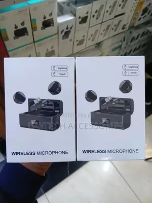 Wireless Lavalier Microphones With Charging Cases.