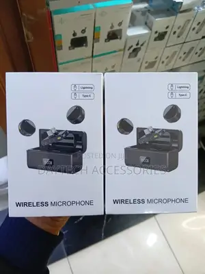 Wireless Lavalier Microphones With Charging Cases.