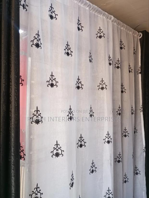 Sheer With Black Details to Match a Black Curtain