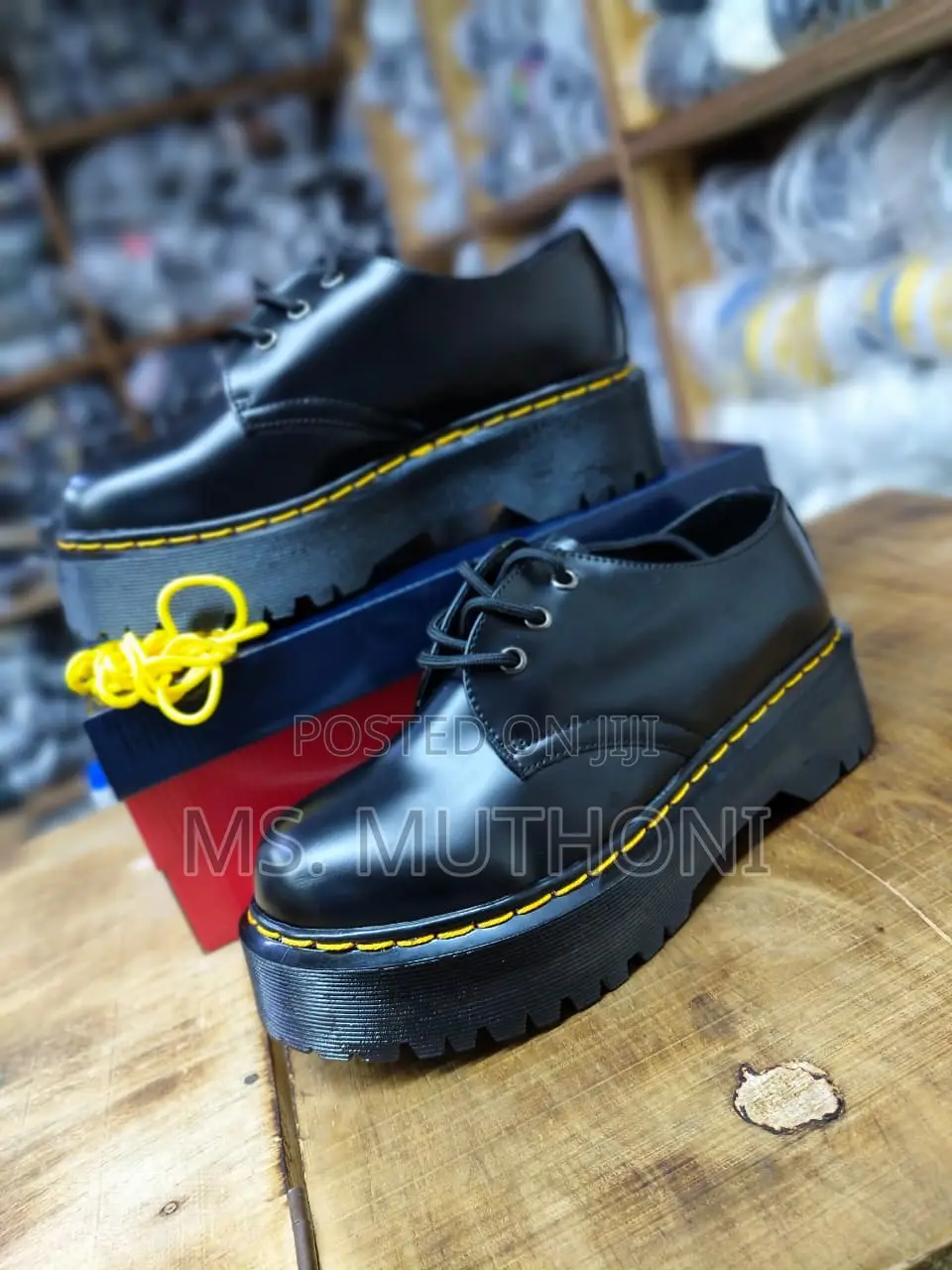 Dr. Martens Jadon 8-Eye Platform Boot in Black Polished Smooth Leather
