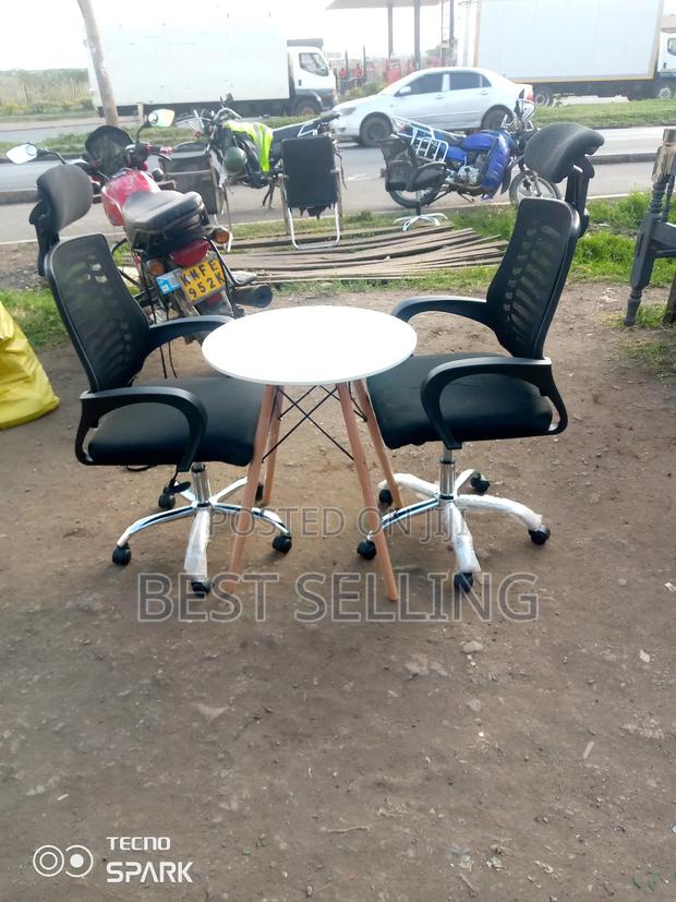 Office Chair and Round Eams Table