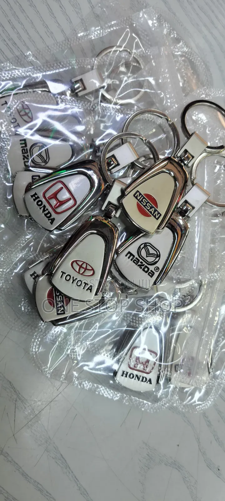 Honda,Nissan,Mazda White Branded Key Chains