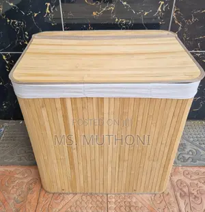 Bamboo Laundry Basket With a Lid and Three Internal Compartments.