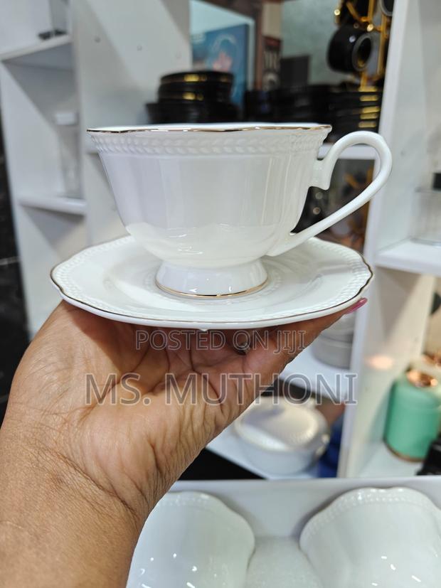 White 12-Piece Porcelain Tea Set With Gold Trim. - thumbnail 4