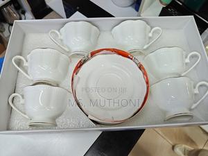 White 12-Piece Porcelain Tea Set With Gold Trim. - thumbnail 2