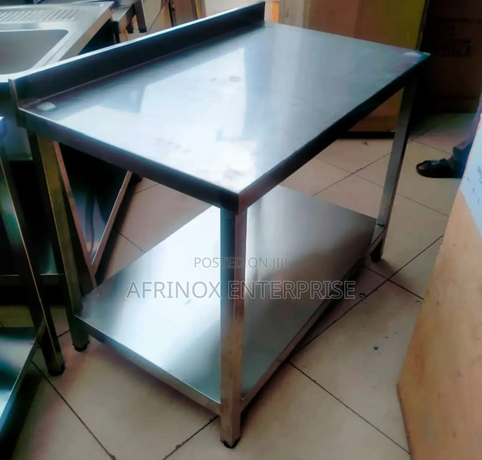 Four Feets Table. Stainless Steel Working Table