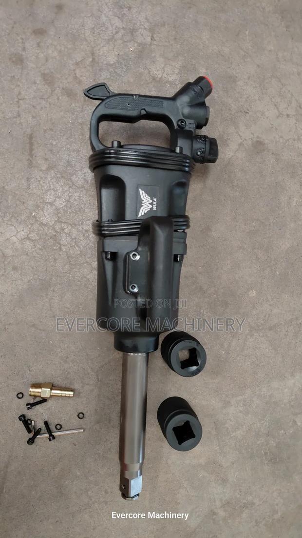 Commercial Pneumatic Impact Wrench Machine With Nuts Accessories.