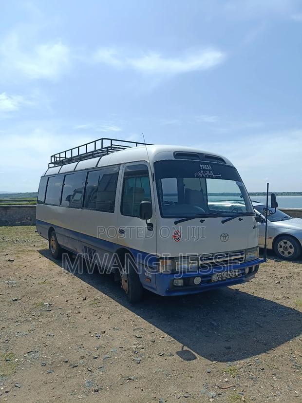 Toyota Coaster 2007 White - thumbnail 2