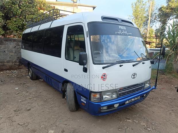 Toyota Coaster 2007 White - thumbnail 4