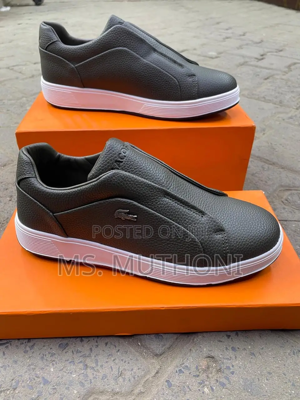 Lacoste Men's Matteo Slip-on Sneakers With a Faux Leather Upper.