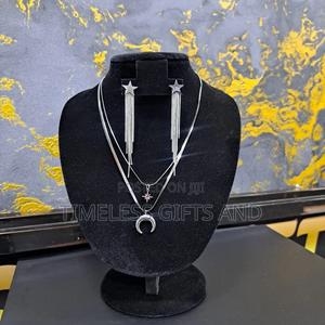 Silver Star Earrings and Star and Moon Layered Necklace - thumbnail 2