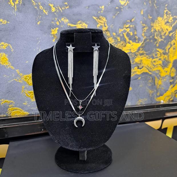 Silver Star Earrings and Star and Moon Layered Necklace - main view