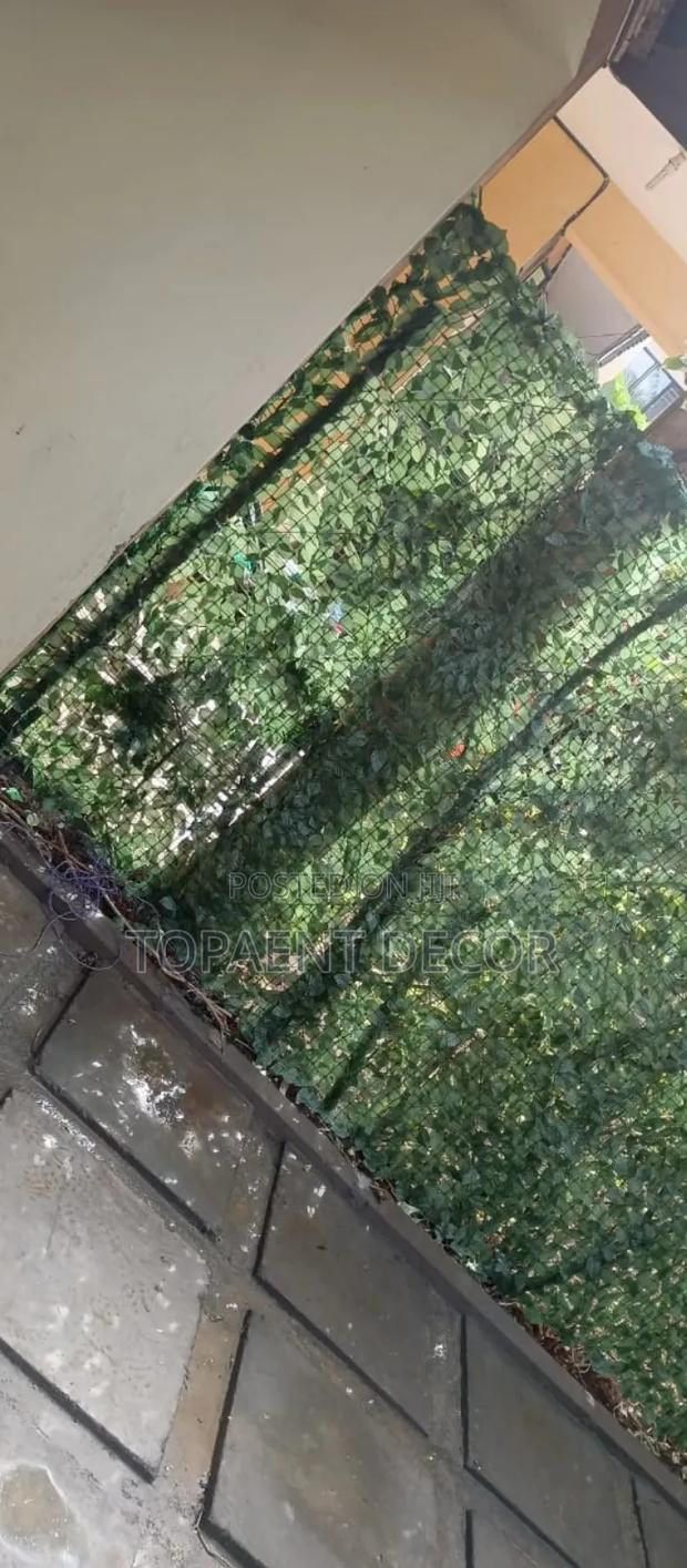 Green Leafy Fully Patched Artificial Privacy Fence - main view