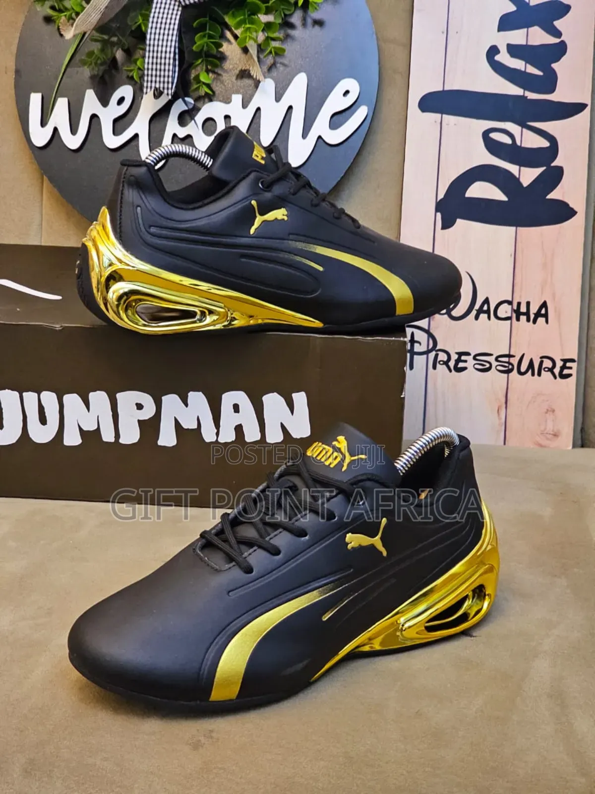 Puma Super Gt Sneakers In Black And Gold.