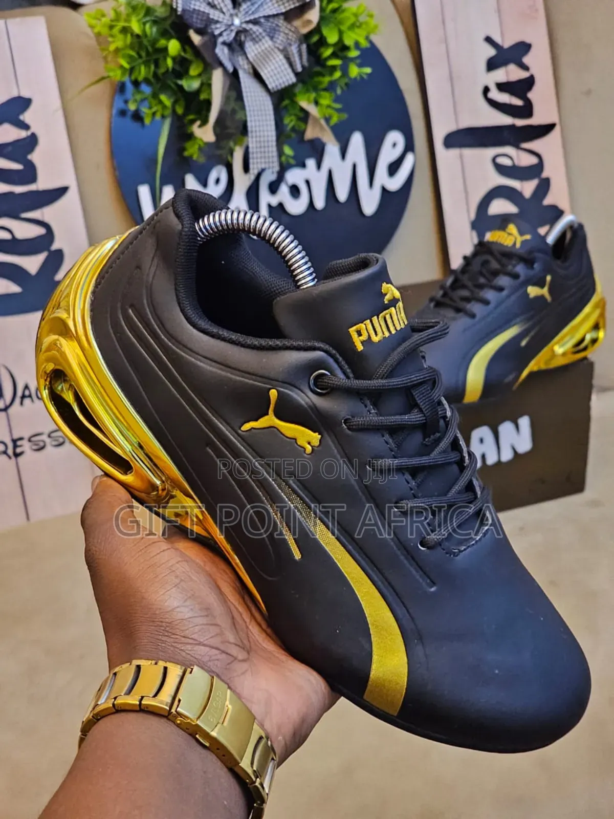 Puma Super Gt Sneakers In Black And Gold.
