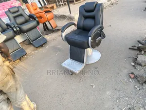 Rotating Silver Barber Chairs