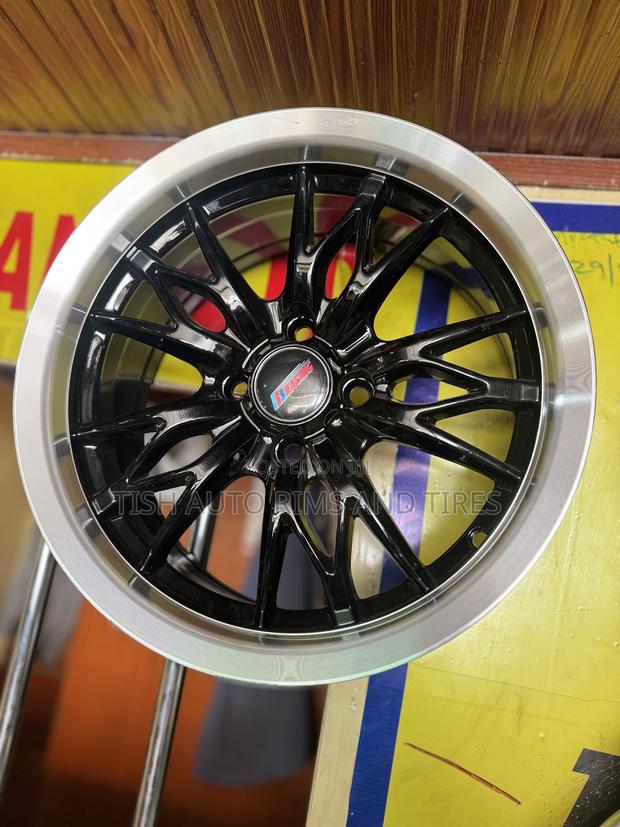 Unique Black And Silver 15 Inch Rims Set 4*100