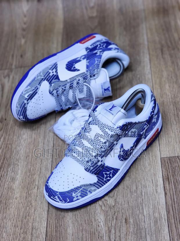 Louis Vuitton X Nike Sb Dunk Low Sneakers In A White And Blue
