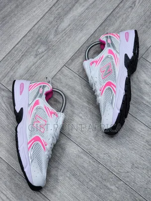 New Balance 530 Sneakers In White With Pink