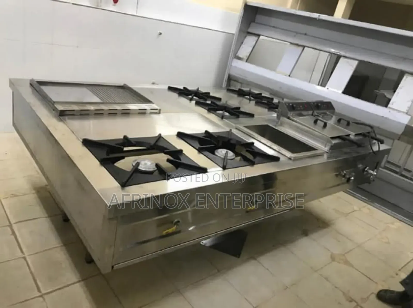 Combined Cooker, 6 Burners, Griddle, Deep Fryer and Chips Dumper.