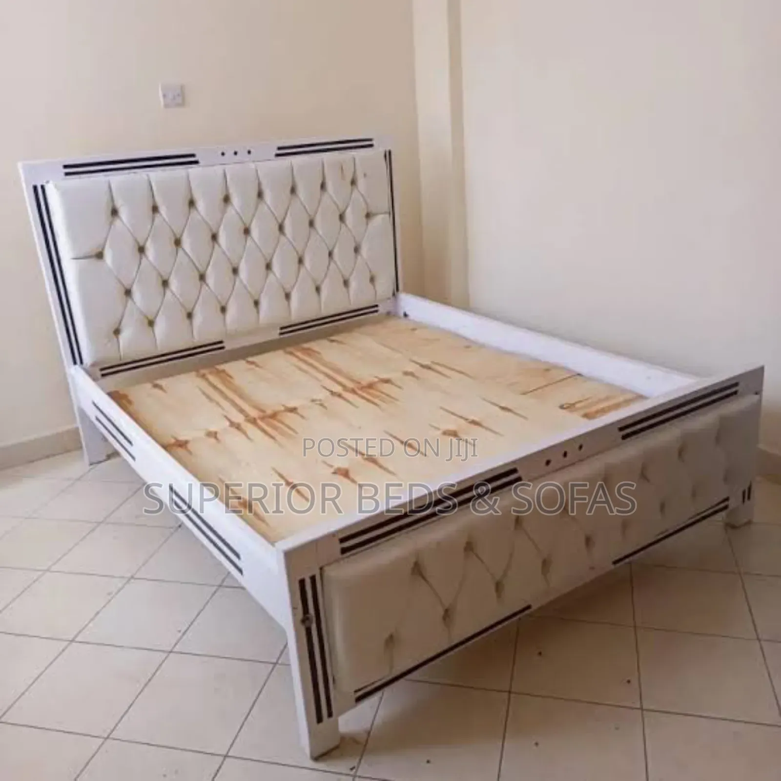 White Tufted Upholstered Bed Size 5 by 6.
