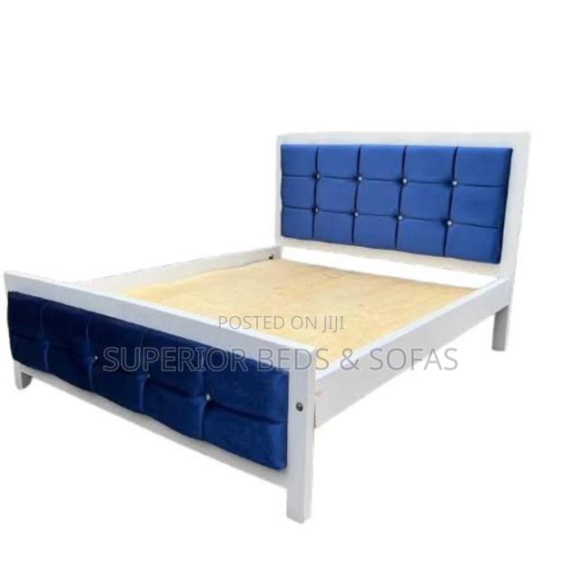 Blue Tufted 5 by 6 Bed Frame