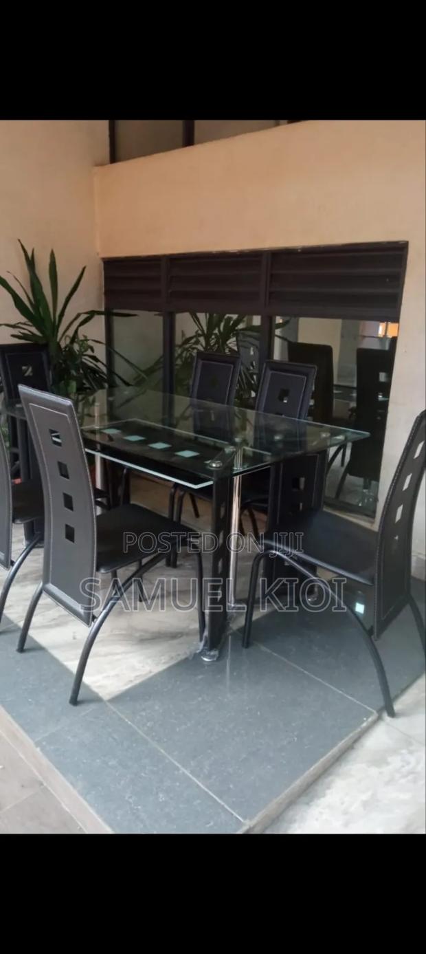 Executive 6 Sitter Glass Dinning Table With Leather Seat - main view