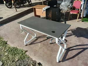 Black Office Chair and Grey Metallic Study Table Available