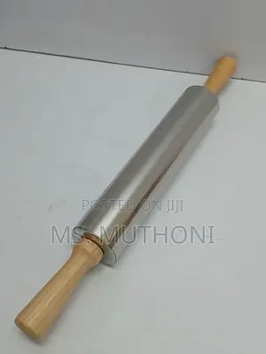 Stainless Steel Non-Stick Rolling Pin With Wooden Handles.