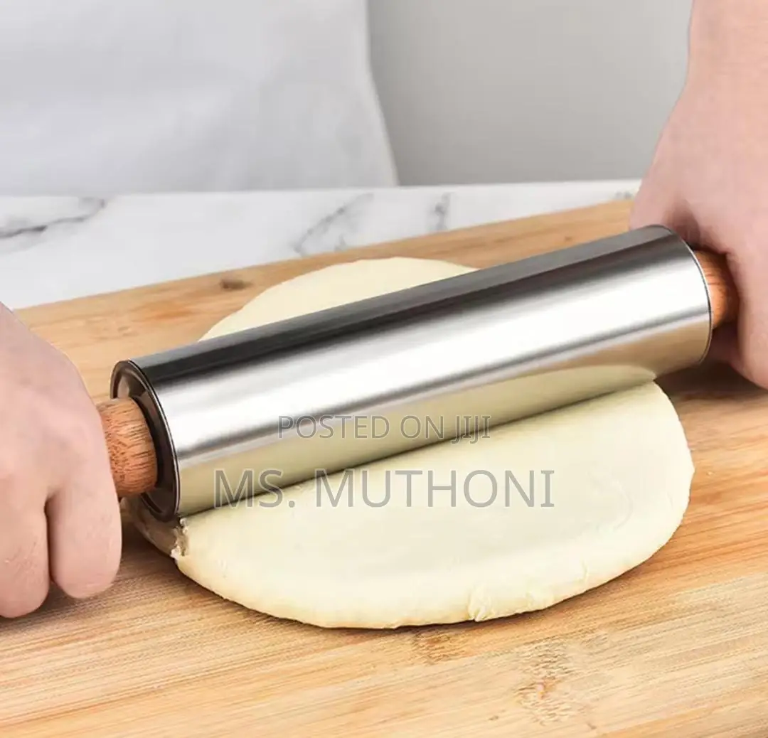 Stainless Steel Non-Stick Rolling Pin With Wooden Handles.