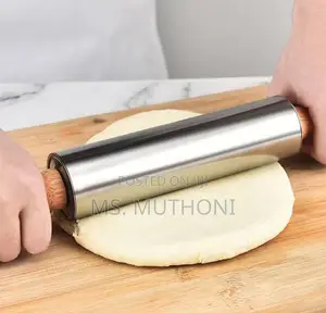 Stainless Steel Non-Stick Rolling Pin With Wooden Handles.