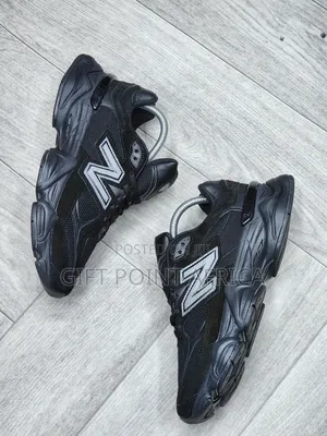New Balance 9060 "Black Cement" Or "Triple Black" Sneaker.