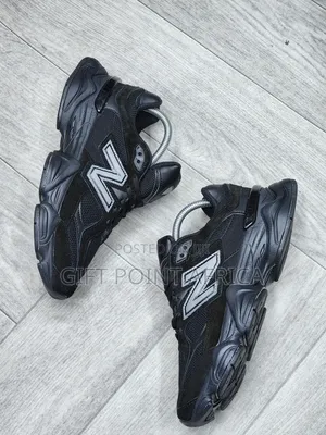 New Balance 9060 "Black Cement" Or "Triple Black" Sneaker.