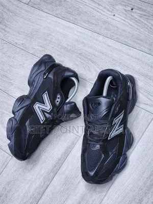 New Balance 9060 "Black Cement" Or "Triple Black" Sneaker.
