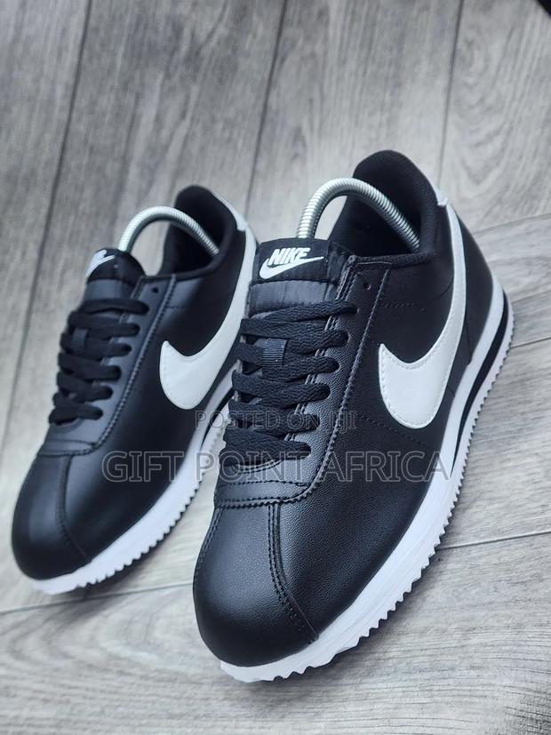 Nike Cortez Basic Leather Shoes In A Black And White