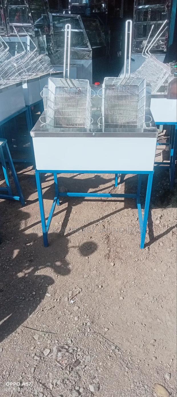 Double Fryer Used To Frying Chips, Sausage And Mandazi