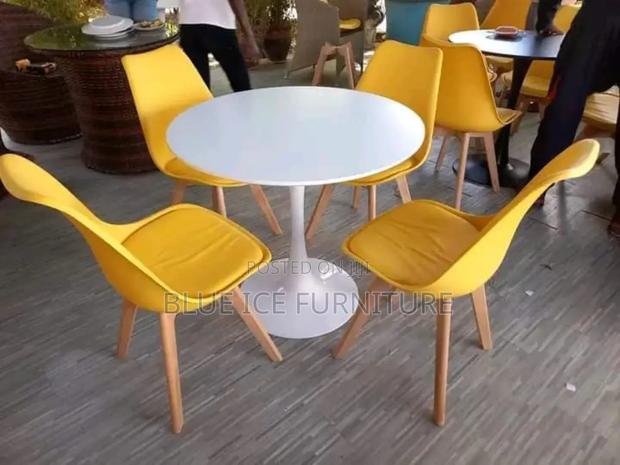 Round Dining Table and Padded Eames Chair - main view