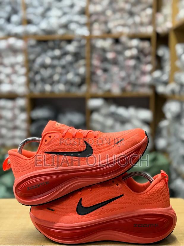 Nike Vomero Plus Running Shoe in the "Orange Pulse" - thumbnail 3