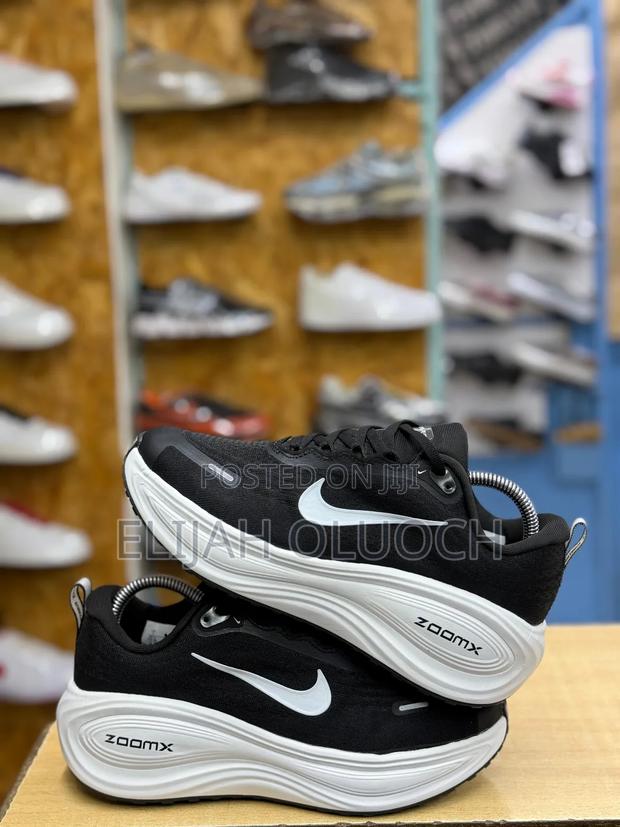 Black Nike Vomero Plus Road Running Shoes With White Zoomx Midsoles