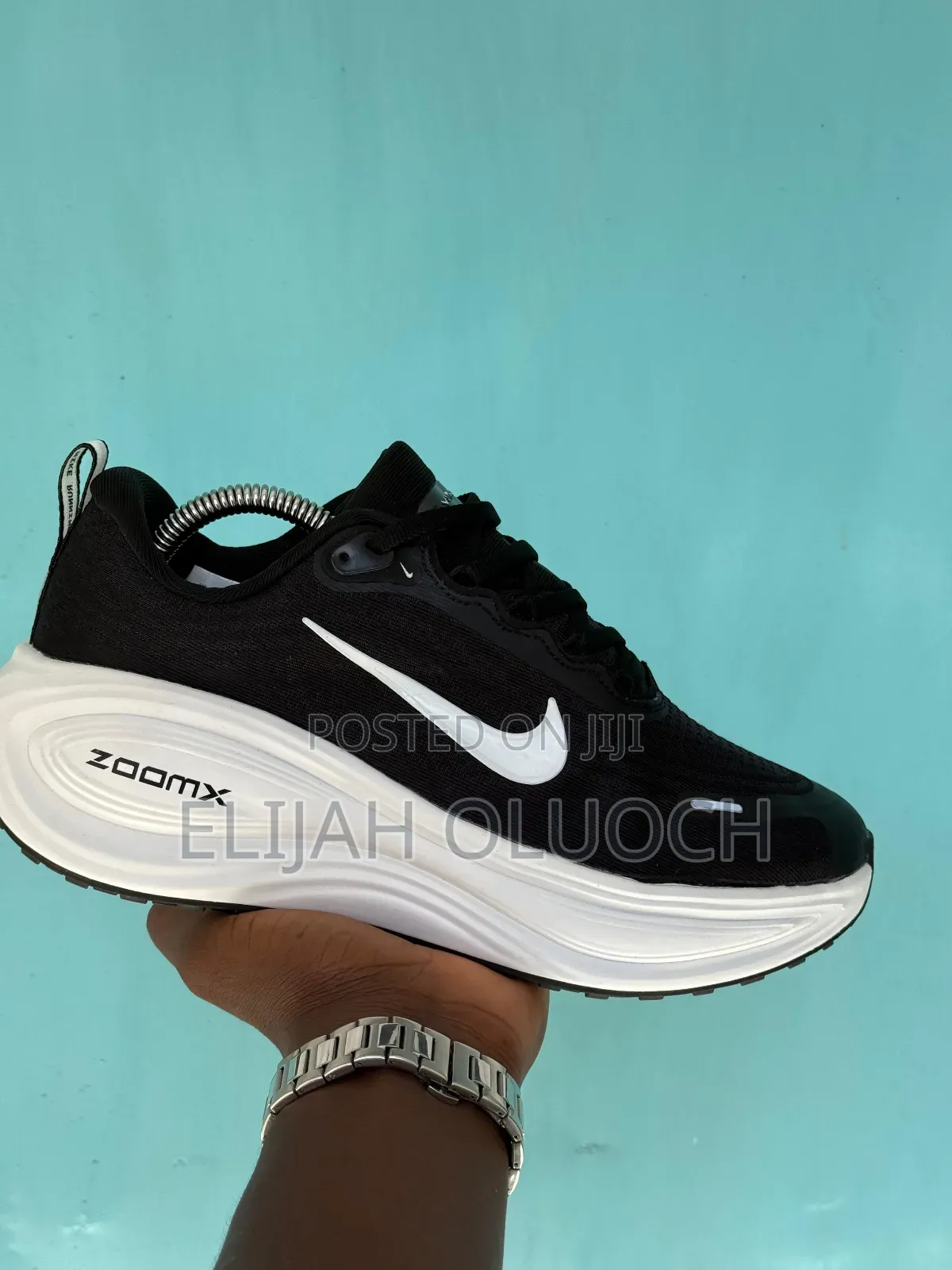 Black Nike Vomero Plus Road Running Shoes With White Zoomx Midsoles