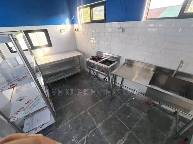 Modern Stainless Kitchen Storage Area Racks ,Tables and Sink
