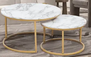 Marble-Nesting Coffee Tables With Gold-Tone Metal Bases.
